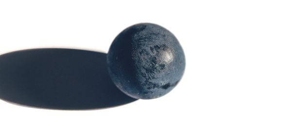 Close up of a grape with shadow