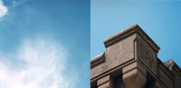 Image split in 2 : blue sky on the left and corner of the Château building on the right